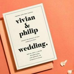 a wedding card with the words, virgin and philip on it next to some garlic