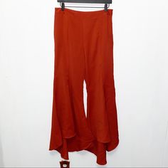 Lulumari Rusty Orange Flare Ruffle Pants Features High Waist, Side Zip Closure And Non Stretch Size L Waist 15in Across, Rise 12in, Inseam 32in Excellent Condition, Brand New Rust Flare Pants, Orange Flared Pants, Stretch Full-length Ruffled Pants, Orange Corduroy Flare Pants, Orange High-waisted Pants With Elastic Waistband, Ruffle Pants, Side Zip, Pant Jumpsuit, Pants For Women