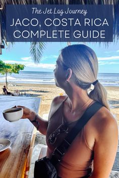 a woman sitting at a table with a bowl in her hand and the words, the jet lag journey jaco costa rica complete guide