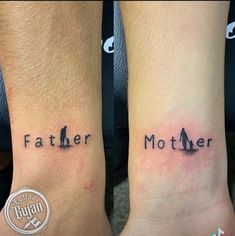 two people with matching tattoos on their arms, one has the word father and the other is