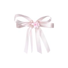 a white ribbon with pink flowers on it's end and a bow at the top