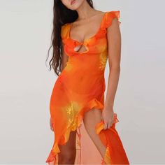 The Sunset Dress shows off style with a flattering mesh sheer tie-dyed print, hollow-out detail, and a ruffled trailing maxi skirt. It features a sexy backless high slit design for a summery, feminine look. Perfect for special occasions. Material: Medium-stretch synthetic fiber Tie-Dye orange yellow Print High Slit Fits true to size Sunset Gown, High Split Dress, Mirror Palais, Sheer Gown, Sleeveless Lace Dress, Long Beach Dress, Split Dress, Beach Wear Dresses, Ruffled Maxi Dress