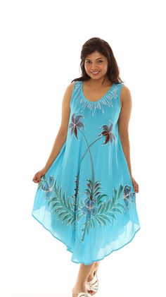 "Build a boho-chic look in no time with this flowing tropical midi sundress adorned with a floral paintbrush print, a scoop neckline, and a curved hem for a dash of extra flair. This dress is made with rayon fabric and is lightweight, relaxed fitting, endlessly flattering, and perfect for comfortable casual summer wear. It can be used as a beach cover-up. This beach-ready summer sundress is perfect for lounging around the house, traveling, lounging by the pool, strolling along the boardwalk, and Floral Print Sleeveless Dress For Beach Vacation, Floral Print Sleeveless Dress For Beach Season, Sleeveless Floral Print Beach Dress For Vacation, Tropical Sleeveless Sundress For The Beach, Multicolor Tropical Sleeveless Dress For Vacation, Floral Print Sleeveless Beach Dress, Sleeveless Floral Print Dress For Beach, Flowy Sleeveless Summer Beach Dress, Summer Printed Sundress As Beach Cover-up