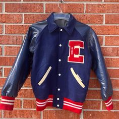 Red & Navy Varsity Jacket For A Band Member From The 70s, Pointy Collar, Size M Navy Retro Varsity Jacket With Long Sleeves, Vintage Navy Varsity Jacket For Winter, Retro Navy Outerwear With Long Sleeves, Navy Retro Long Sleeve Outerwear, Retro Navy Long Sleeve Outerwear, Vintage Blue Outerwear For College, Retro Blue Varsity Jacket For Fall, Vintage Red Varsity Jacket With Long Sleeves, American Retro Long Sleeve Outerwear For Fall