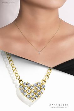 A darling petite heart is adorned with hand picked pavé diamonds to create a necklace symbolizing eternal love. Crafted from luxurious 14k yellow gold and studded with 0.05cts of shimmering diamonds, it's sure to sparkle its way into her heart.  NK5450Y45JJ #gabrieljewelry #gabrielnecklace #gabrielring #gabrielearrings #gabrielbracelet #GabrielNY #DiamondJewelry #FineJewelry #GabrielAndCo #UniqueJewelry #Jewelry #FashionJewelry #GiftIdeas #UniqueGifts #Necklaces #DiamondNecklace #GoldNecklace Gold Diamond Heart Necklace, Gabriel Jewelry, Pendant Heart, Heart Necklace Diamond, Classic Necklace, Jewelry Pendant, Eternal Love, Dream Jewelry, Diamond Heart