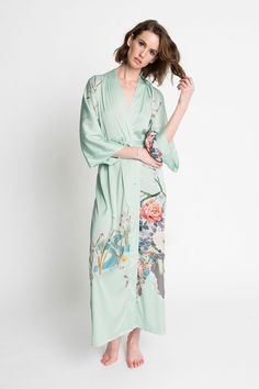 KIM + ONO Spring Floral Long Kimono Robe – kimandono.com Spring Maxi Kimono With Tie Waist, Maxi Length Spring Kimono With Tie Waist, Green Wrap Kimono With Tie Waist, Spring Maxi Dress With Tie Waist And Kimono Sleeves, Spring Kimono With Tie Waist And Kimono Sleeves, Spring Maxi Length Robe For Loungewear, Bohemian Floor-length Kimono For Spring, Green Floral Print Long Robe, Green Long Floral Print Robe