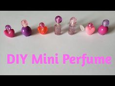 there are different types of small perfumes in the same color and size as shown