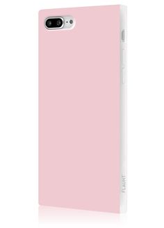 a pink iphone case sitting on top of a white surface