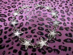 Buy any 2 Jewelry Items and get a 3rd item at equal or lesser value FREE !                                                                                                                                                                                                                                     Star link Bracelet. Handcrafted out of Sliver Plated mixed alloy charm pendants with extender   FREE Organza Gift Bag  Gift box available  Handcrafted In The U.S. Thank You For Visting Rebeltude ! Car Show Girls, Celestial Bracelet, Silver Star Bracelet, Star Charm Bracelet, Star Shopping, Biker Bracelet, Charm Bracelet Silver, Punk Makeup, Recycled Items