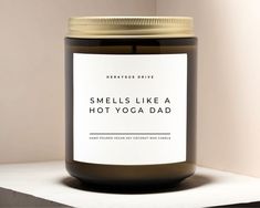 a candle that says smells like a hot yoga dad