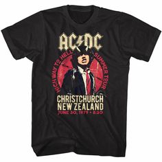 "AC/DC Men's T-Shirt by American Classics Part Scottish, part Aussie, 100% Rock Legends! Formed in Sydney in 1973, AC/DC went from Dirty Deeds Done Dirt Cheap on the Highway to Hell to Back to Black in The Flick of the Switch! They have sold over 200 million albums worldwide and they are still working on new music. Wear some rock history, this cool ACDC New Zealand Summer Tour 1979 Men's T-Shirt has a vintage style print with a distressed look as if you bought it at an AC/DC Concert Tour in the 80's     What's included:   Black printed t-shirt  Available in all sizes and Big & Tall sizes (S, M, L, XL, 2XL, 3XL, 4XL, 5XL, 6XL, LT, XLT, 2XLT, 3XLT, 4XLT)  Officially licensed apparel  Made of quality 100% cotton  Full-color vintage style print to the chest  Double needle sleeve and bottom hem New Zealand Summer, Rock Band Shirts, Black Tees, Christchurch New Zealand, Highway To Hell, Black Shirts, Heavy Metal Music, Summer Tour, Disney Stars