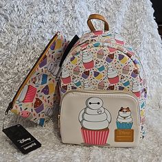 New Loungefly Disney Big Hero 6 Baymax Allover Print Cupcake Mini Backpack And Make-Up Bag. See Pictures For More Details And Measurements. Price Is Firm. Please Do Not Send Offers Unless Bundled With Other Items With A Reasonable Offer. Combine Orders Into A Bundle And Pay For Only One Shipping. C-67 C-61 C-46 Disney Style Daily Backpack, Disney Backpack For Everyday Use, Disney Bags For Everyday Use And Back To School, Disney Big Hero 6, Backpacks Accessories, Loungefly Bag, Fandom Outfits, Loungefly Disney, Baymax