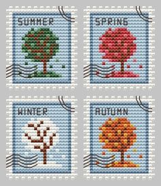 four cross stitch stamps with trees and words on them, each featuring the same color