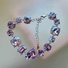 Photos are taken under natural sunlight and from different angles.  NO FILTER, NO FLASH. Suitable for wrist sizes: 12-17 cm. The length of the crystal part is 13 cm. Swarovski crystals.  2 options for the setting material: -925 sterling silver (Less allergenic, durable and tarnish-resistant) -gold plated brass (it will likely tarnish and corrode when exposed to sweat or water.) ------------------------------------------------------------------------------------------ Hey there! Check out my hand Sparkling Dazzling Bracelets For Gifts, Sparkling Bracelets For Gifts, Dazzling Bracelets With Sparkling Stones For Gifts, Purple Crystal Bracelets For Gift, Purple Crystal Bracelets As Gift, Purple Crystal Bracelet As A Gift, Sparkling Purple Jewelry For Gift, Sparkling Purple Jewelry Gift, Silver Faceted Bracelets For Party