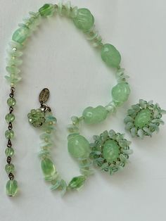 "Visit my eclectic compact and makeup antique/vintage, one-of-a-kind, rare gifts shop by clicking or copy and paste this link into your browser: https://www.etsy.com/shop/CompactQueen?ref=seller-platform-mcnav Miriam Haskell Set Necklace Earrings GORGEOUS Lush Sea foam green Gripoix glass textured opaque & translucent Exquisite Signed Vintage This exquisitely GORGEOUS necklace and earring set by Miriam Haskell is a must-have for the collector! The subtle sea foam green color variations are mesme Miriam Haskell Necklace, Gold Costume Jewelry, Miriam Haskell Jewelry, Rare Gifts, Miriam Haskell, Mid Century Jewelry, Glass Texture, Wedding Jewelry Sets, Vintage Jewels