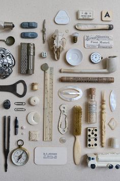 there are many different items on the table together, including scissors and other things to make it look like they have been made out of wood