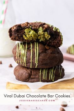 two chocolate cookies stacked on top of each other