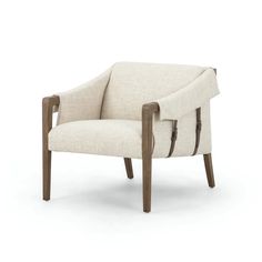 a white chair with wooden legs and armrests