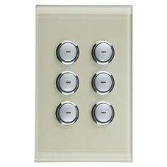 an image of a light switch plate with four knobs