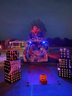 a truck decorated for halloween with pumpkins and decorations