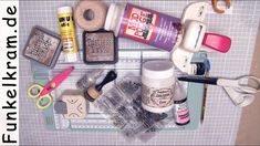 various crafting supplies laid out on top of a cutting board with scissors and tape