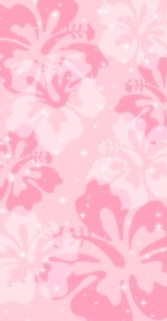 a pink and white flower pattern with sparkles