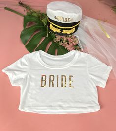 two t - shirts with the word bride on them