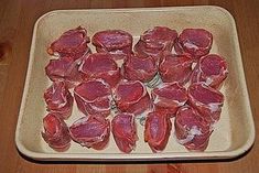 raw meat on a tray ready to be cooked