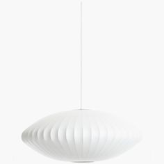 a white light hanging from a ceiling fixture