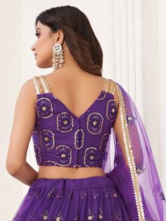 Let your elegance reflect and receive compliments with the stunning Pretty Purple Butterfly Net Lehenga Choli from Ethnic Plus. This exquisite lehenga choli in a beautiful purple color is made from high-quality butterfly net material.
Designed with a V shape neck, this party wear lehenga is sure to make you the center of attention at any occasion. The A-line silhouette flatters every body type, giving you an elegant and graceful appearance.
The lehenga comes semi-stitched and can be customized u Purple Art Silk Sharara With Dupatta, Designer Purple Art Silk Sharara, Purple Art Silk Sharara For Diwali, Designer Purple Sharara For Festivals, Designer Festival Sharara In Purple, Festive Purple Art Silk Sharara, Purple Designer Wear Sets For Navratri, Designer Purple Sets For Navratri, Fitted Purple Saree For Eid