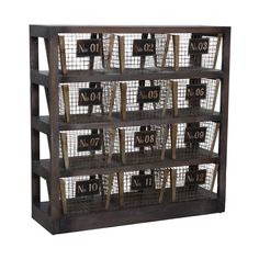 a wooden shelf filled with lots of metal baskets