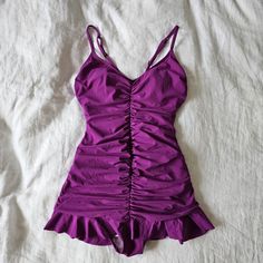 The Tag Says Sz 8 But It Fits Like A Small. Could Maybe Stretch To Fit A Medium. Never Worn Purple Ruched Fitted Swimwear, Purple Fitted Ruched Swimwear, Fitted Purple Ruched Swimwear, Fitted Ruched Purple Swimwear, Purple One Piece, Purple Swimsuit, It Fits, Color Purple, Womens Swim