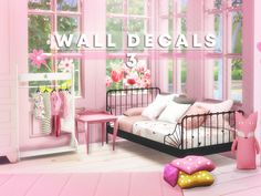 there is a pink and black bedroom with flowers on the window sill in front of it