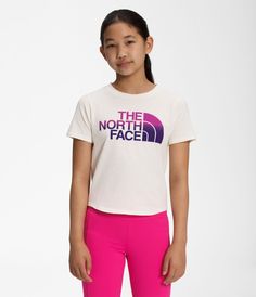 With an array of colors and graphics, there is a Girls' Short Sleeve Graphic Tee to pair with her exploration style.Details: Set-in sleeves 06A, 3X3, 567, 626, DYX, FN4, GAV, JK3, Q4C, QC6: no-hand, water-based, screen-printed graphic on chest; 174, 3R3, 4S8, A3M, A7M, L4U, N3N, UBF: logo graphic on chest; 3R8, 3X5, 4P1, 56B: logo on left chest and graphic on back; GS0: graphic on left chest Curved hem with a triangle insert at side seams Standard fit The North Face style# NF0A5J46 Sporty Cotton Tops By The North Face, Sporty The North Face Cotton Tops, The North Face Sporty Cotton Tops, White Crew Neck Top By The North Face, The North Face Crew Neck Top For Summer, The North Face Cotton Graphic Tee, Sporty White Tops By The North Face, The North Face White Casual Tops, Sporty White Tops From The North Face