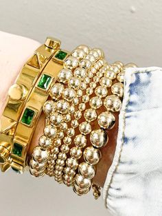 With large emerald baguettes, you can't go wrong. Stack this bracelet or don't - it will shine either way! 18k gold plated over stainless steel Hypoallergenic Tarnish and Water Resistant (see our full collection) By Sahira Jewelry Design Brazilian Gold, Emerald Band, Expensive Jewelry Luxury, Large Bracelet, Jewelry Luxury, Beaded Wrap Bracelets, Simple Bracelets, Don't Settle, Expensive Jewelry