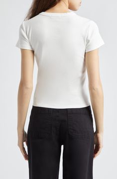 Mini ribs hug your shape in a T-shirt made from supersoft cotton and modal. 20 1/2" length (size Medium) Crewneck Short sleeves 52% cotton, 43% Tencel® modal, 5% spandex Tencel modal is a sustainably produced fiber made with closed-loop processing and is certified with the EU Ecolabel as having a low environmental impact throughout the entire lifecycle Machine wash, tumble dry Imported Fitted Ribbed Short Sleeve Top, Ribbed Cotton V-neck T-shirt, Stretch Top With Ribbed Neckline And Short Sleeves, Fitted Ribbed T-shirt With Scoop Neck, Ribbed Crew Neck Top With Minimal Stretch, Cotton T-shirt With Ribbed Neckline, Everyday Fitted T-shirt With Ribbed Neckline, Fitted T-shirt With Ribbed Neckline For Everyday, Fitted T-shirt With Ribbed Neckline