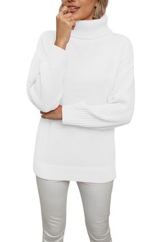 Chic White Knit Turtleneck, White Ribbed Knit Turtleneck, White Turtleneck Knit Top For Layering, White Ribbed Turtleneck For Layering, Knit Turtleneck With Ribbed Cuffs, White Ribbed Knit Top For Fall, Oversized White Ribbed Sweater, Trendy White High Neck Sweater, Chic White Batwing Sleeve Sweater