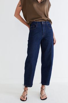 Our classic barrel leg denim pants in a new dark wash. A tapered leg and a wider leg makes for a flattering fit. Barrel leg Belt loops 2 side pockets 2 Back Pockets Slight stretch Dark Wide Leg Jeans, Barrel Leg Jeans, Long Denim Jacket, Barrel Jeans, Denim Tunic, Denim Cargo Pants, Spring Inspo, Leg Belt, Corduroy Blazer