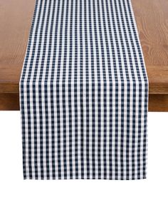 a black and white checkered table runner