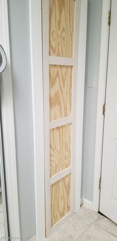 the inside of a door with some wood on it