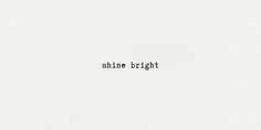 the word shine bright written in black ink on white paper