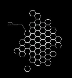 a black and white photo of hexagons on a black background with an arrow pointing to them