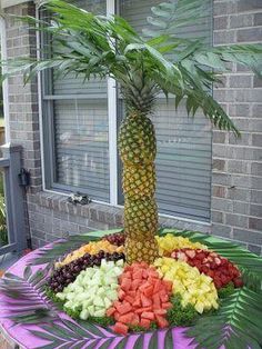 a palm tree made out of fruits and vegetables