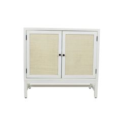 a white cabinet with two doors and wicker panels