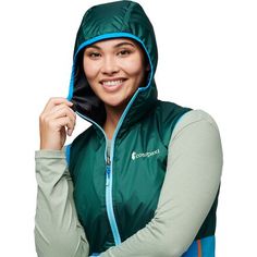 The Cotopaxi Teca Calido Hooded Vest is too versatile and convenient to not wear it almost every day. Since it packs into its own pocket, we're able to bring it along for movies, hikes, and flights. The synthetic insulation packs in the heat, while the reversible design lets us dress according to our mood. Green Functional Hoodie With Adjustable Hood, Functional Green Hoodie With Adjustable Hood, Nylon Hooded Hoodie For Hiking, Hooded Nylon Hoodie For Hiking, Functional Hiking Hoodie With Detachable Hood, Nylon Hiking Hoodie With Drawstring Hood, Green Nylon Hooded Jacket For Hiking, Nylon Hiking Outerwear With Kangaroo Pocket, Nylon Outerwear With Kangaroo Pocket For Hiking