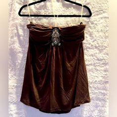 Candies Brown Sleeveless Top W/Beading Detail Size Xl Measures 16” Across Chest X 19.5” Length Material: 100% Rayon Stretchy Soft Material Beading Detail In Front Of Top (See Photo) Brown Sleeveless Evening Tops, Embellished Sleeveless Top For Evening, Sleeveless Embellished Top For Evening, Embellished Fitted Sleeveless Camisole, Spring Embellished Sleeveless Halter Top, Fitted Embellished Sleeveless Camisole, Sleeveless Brown Tops For Night Out, Embellished Sleeveless Halter Top For Summer, Brown Sleeveless Top For Night Out