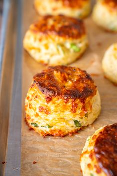 some food is sitting on a baking sheet and ready to be cooked in the oven