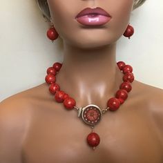 Beautiful Handcrafted Necklace Created By The Seller Using Stunning Sponge Coral Beads, That Are Finished Off With A Unique Clasp That Sits In The Front And Is Embedded With Coral Bits. Matching Earrings Finish Off This Set. This Necklace And Earring Set Is At Home In Many Gatherings, And Would Look Lovely Against A Black Or Deep Blue Outfit. Necklace Is 18” Long, Including The Clasp. The Matching Earrings Are 2-1/2” In Length, Including The Ear Wires. Sponge Coral, Necklace And Earring Set, Handcrafted Necklace, Coral Beads, Blue Outfit, Matching Earrings, Ear Wires, Deep Blue, Womens Jewelry Necklace