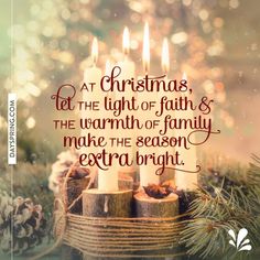 a christmas card with candles and pine cones