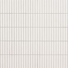 a white tile wall with lines on it